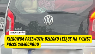 Samochód z dzieckiem na tylniej szybie